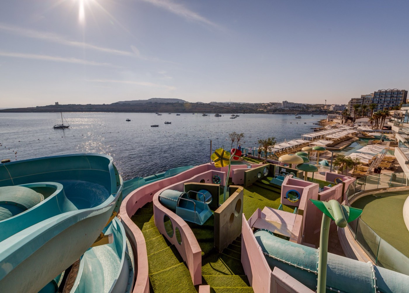 AX ODYCY Hotel rooftop water park overlooking St Paul's Bay — the スーペリア・レジデンス for 16–17s